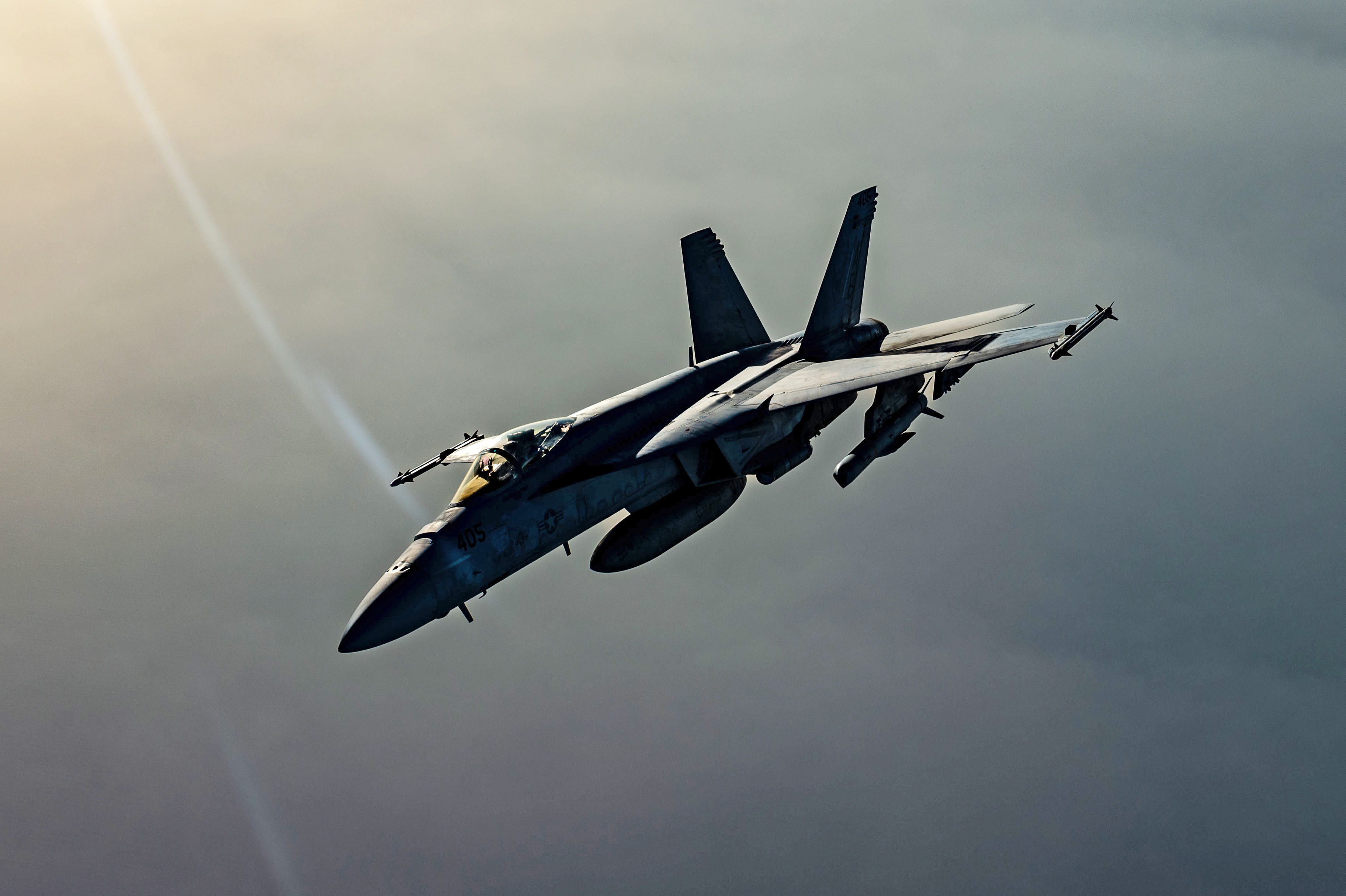 A U.S. Navy F/A-18 Super Hornet, assigned to the Harry S. Truman Carrier Strike Group, flies a mission over the U.S. Central Command area of responsibility, April 8, 2025. The HSTCSG is ready, if called upon, to execute the full spectrum of carrier operations essential to U.S. national security, including the defense of U.S. and partner forces and freedom of navigation to ensure maritime security and stability in the AOR. (U.S. Air Force photo by Staff Sgt. Jackson Manske)