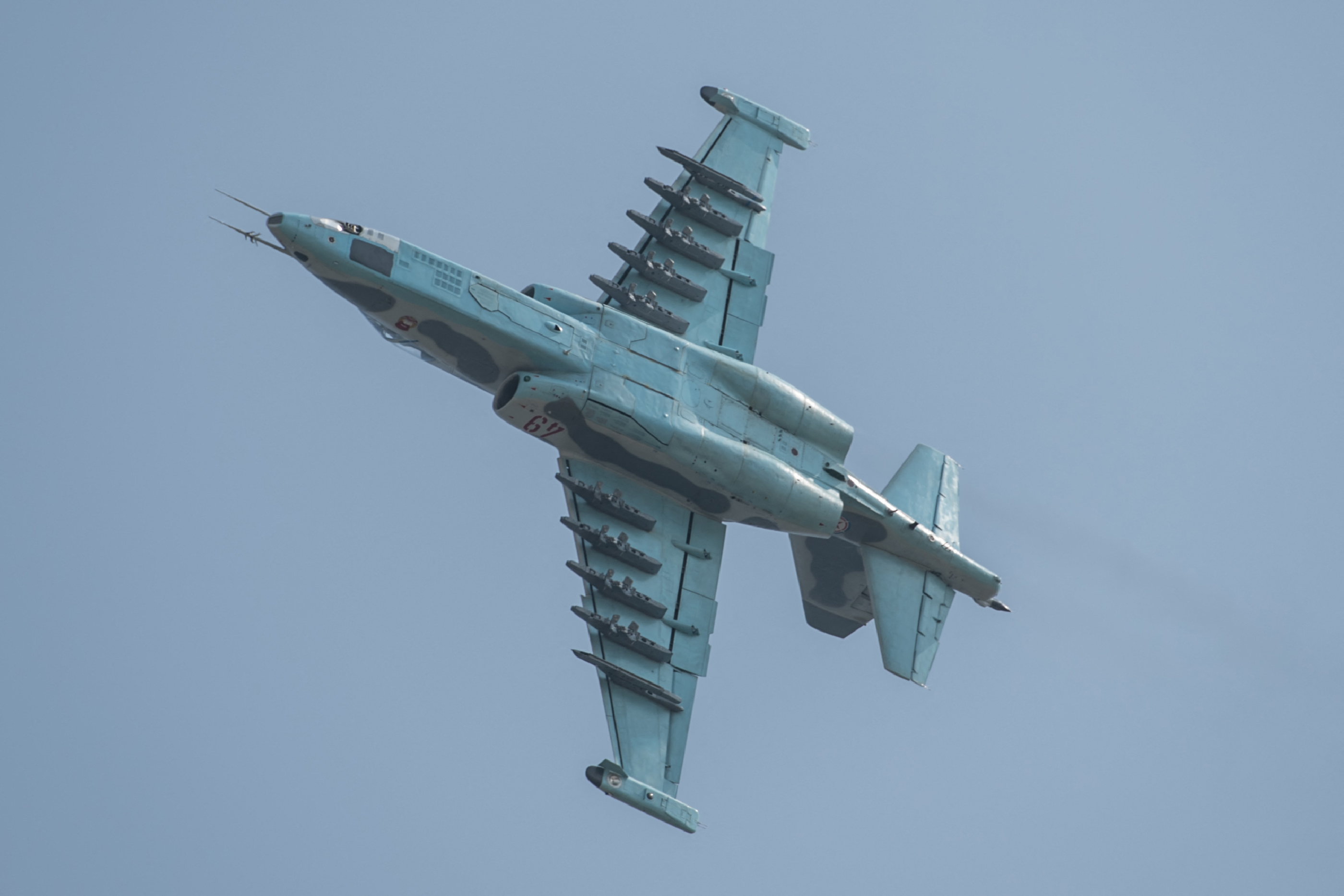 A Sukhoi SU-25 aircraft performs a fly-by during the first Wonsan Friendship Air Festival in Wonsan on September 24, 2016. Just weeks after carrying out its fifth nuclear test, North Korea put on an unprecedented civilian and military air force display on September 24 at the country's first ever public aviation show. (Photo by Ed Jones / AFP) (Photo by ED JONES/AFP via Getty Images)